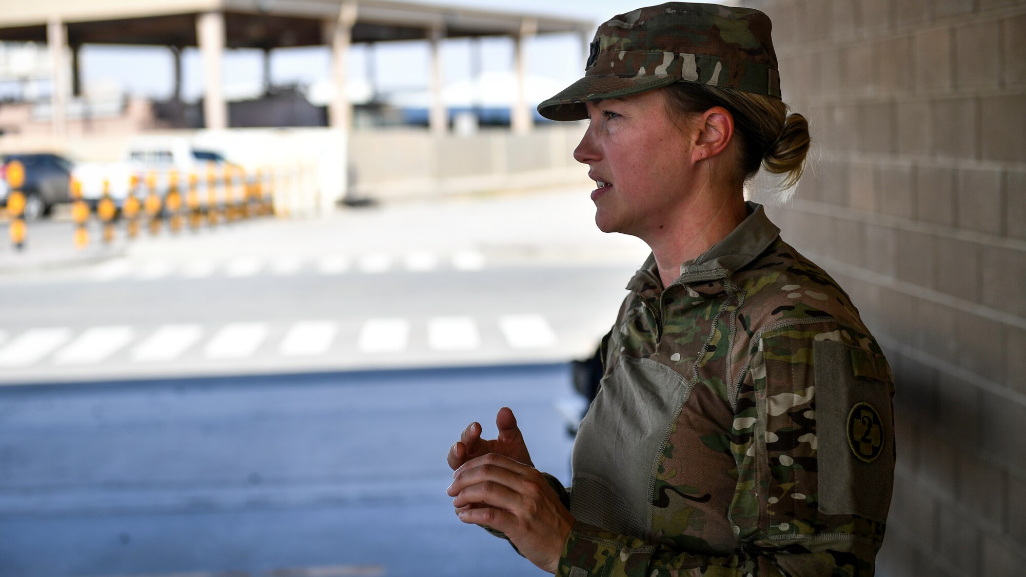 U.S. Army Capt. Amanda Sayers, 149th Medical Detachment Veterinary Service Support veterinarian clinical specialist, speaks about military working dog emergency life-saving procedures at Al Salem Air Base, Kuwait, Sept. 13, 2019. As part of the exercise, U.S. Army veterinary doctors worked with emergency medical responders sharing life-saving measures for MWDs in case of extreme emergencies where veterinary technicians might not be available. (U.S. Air Force photo by Staff Sgt. Mozer O. Da Cunha)