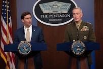 Two defense leaders brief reporters at the Pentagon.