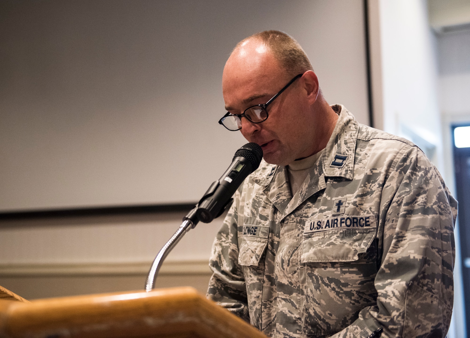 U.S. Air Force Capt. James Longe, 8th Fighter Wing chaplain, gives an invocation during a prisoners of war and missing in action memorial ceremony at Kunsan Air Base, Republic of Korea, Sept. 20, 2019. Leaders from the Wolf Pack and Republic of Korea Air Force’s 38th Fighter Group came together to honor those who are still lost but not forgotten. (U.S. Air Force photo by Senior Airman Stefan Alvarez)