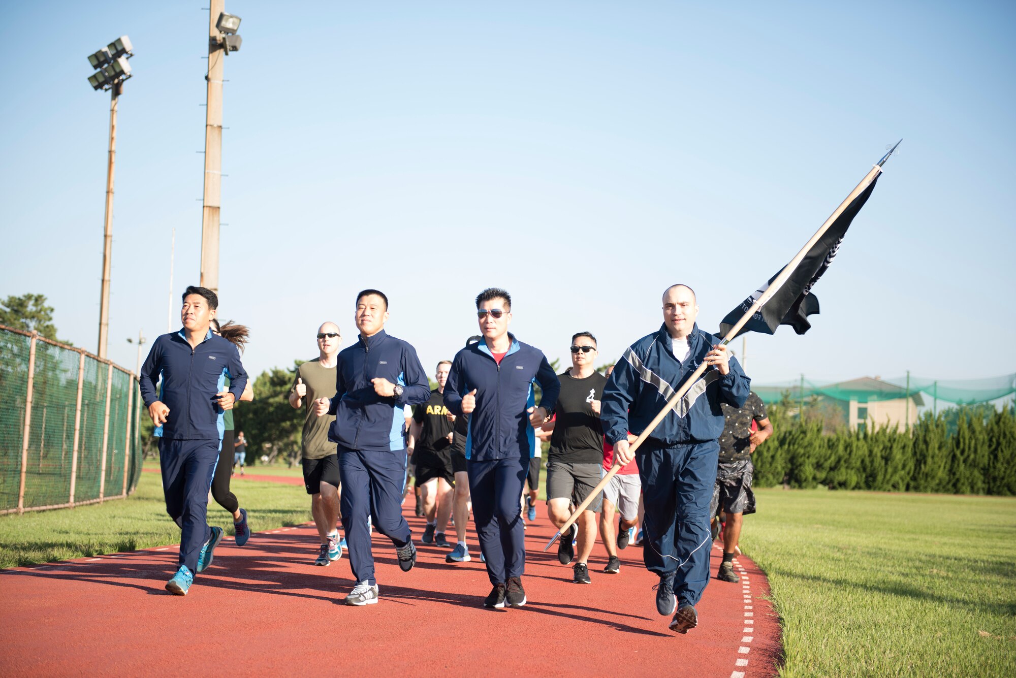 U.S. Air Force Col. Lawrence Sullivan (far right), 8th Fighter Wing vice commander, runs with Republic of Korea Air Force’s 38th Fighter Group leadership to start a 24-hour prisoners of war and missing in action memorial run at Kunsan Air Base, Republic of Korea, Sept. 19, 2019. The Wolf Pack dedicated the week in honor of POW/MIA that consisted of several events for the base to participate in. (U.S. Air Force photo by Senior Airman Stefan Alvarez)