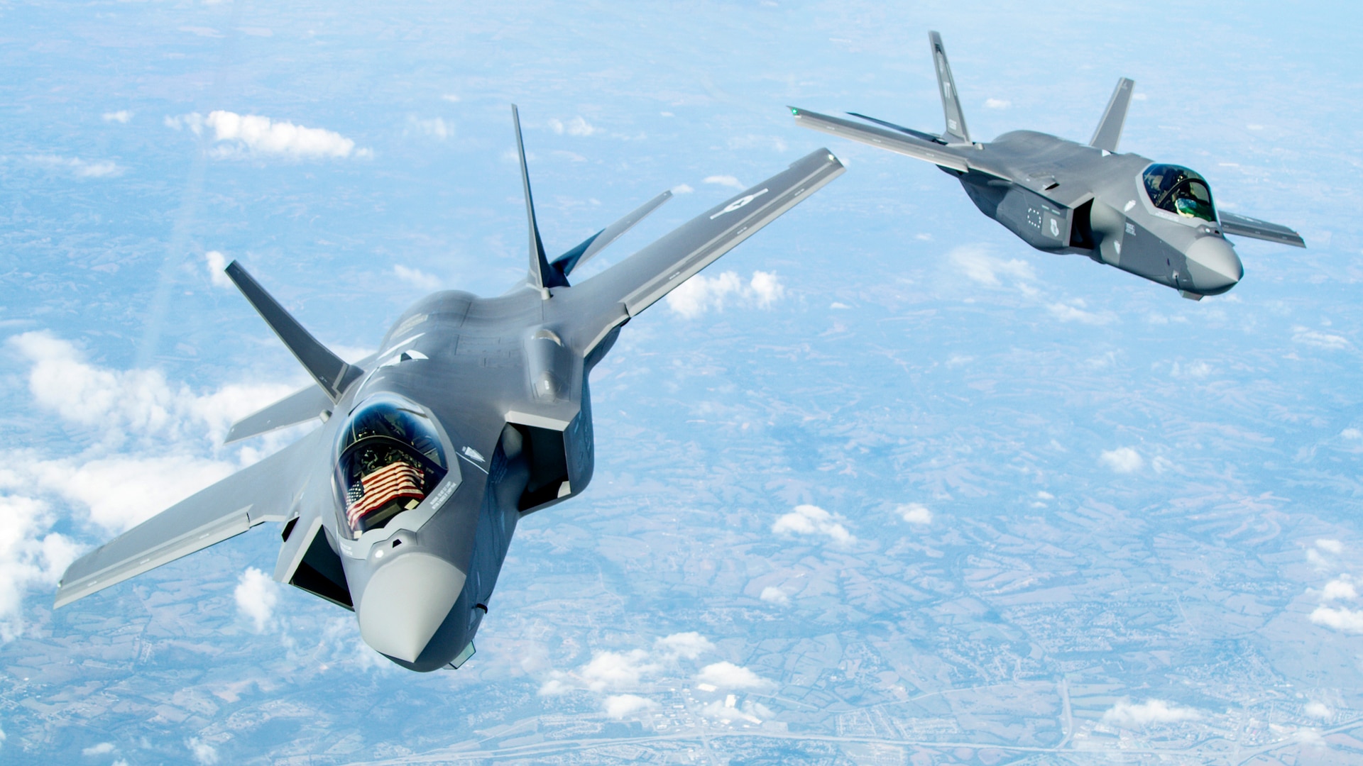 Two F-35 Lightning II’s bank after receiving fuel over the Midwest Sept. 19, 2019. The two aircraft were in route to the 158th Fighter Wing out of the Vermont Air National Guard Base, South Burlington, Vt., the fist Air National Guard unit to receive the aircraft. (U.S. Air Force photo/Master Sgt. Ben Mota)