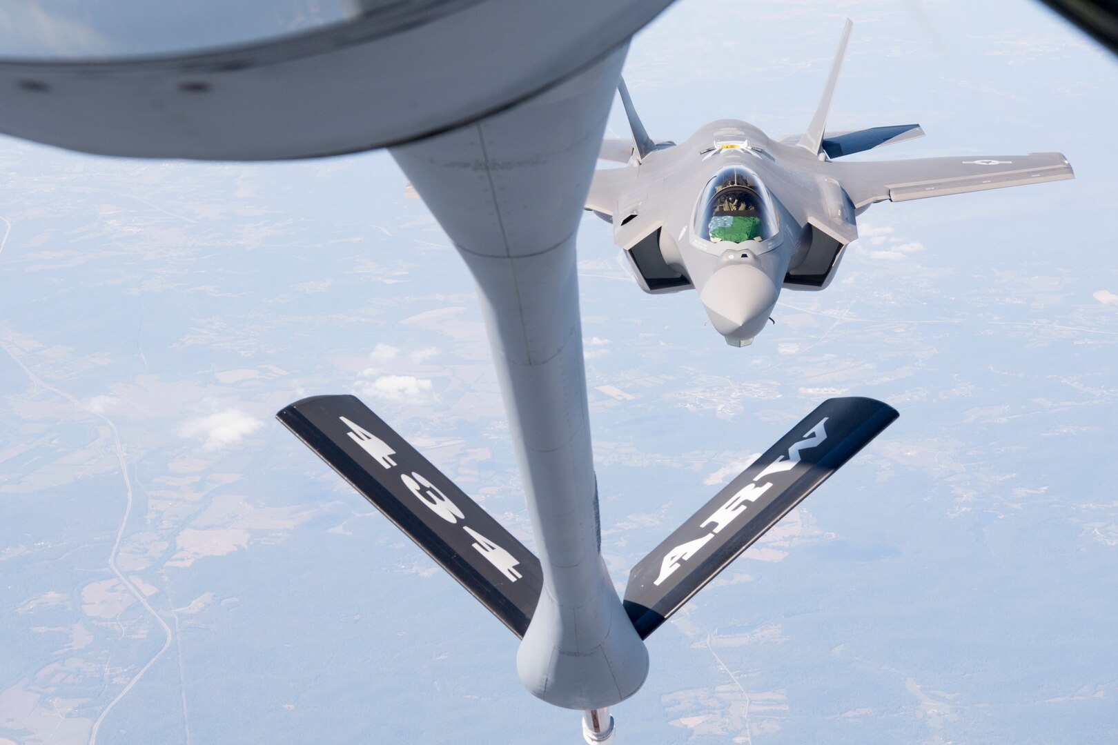An F-35 Lightning II from the 158th Fighter Wing out of the Vermont Air National Guard Base, South Burlington, Vt., pulls up to a 434th Air Refueling Wing KC-135 Stratotanker from Grissom Air Reserve Base, Ind., for fuel over the Midwest Sept. 19, 2019. The 158th FW is the first Air National Guard unit to receive the aircraft, and will be the second operational F-35 wing in the U.S. Air Force. (U.S. Air Force photo/Master Sgt. Ben Mota)