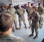 Lt. Gen. Laura Richardson, commander, U.S. Army North, talks to Soldiers during her visit with states leaders impacted by Hurricane Dorian at Homestead Air Reserve Base, Florida, Sept. 6. Army North helps protect the nation by coordinating active duty military support to state and federal partners during disasters.