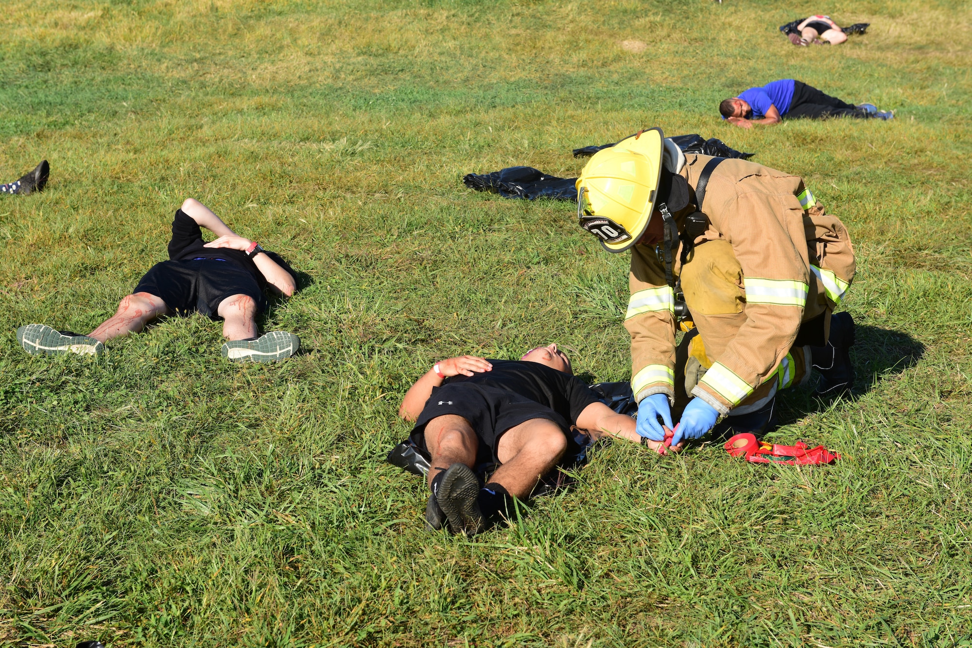 Members of the 193rd Special Operations Wing student flight act as casualties during a simulated aircraft crash exercise held September 21, 2019, at Harrisburg International Airport, in Middletown, Pennsylvania. (U.S. Air National Guard photo by Staff Sgt. Rachel Loftis)