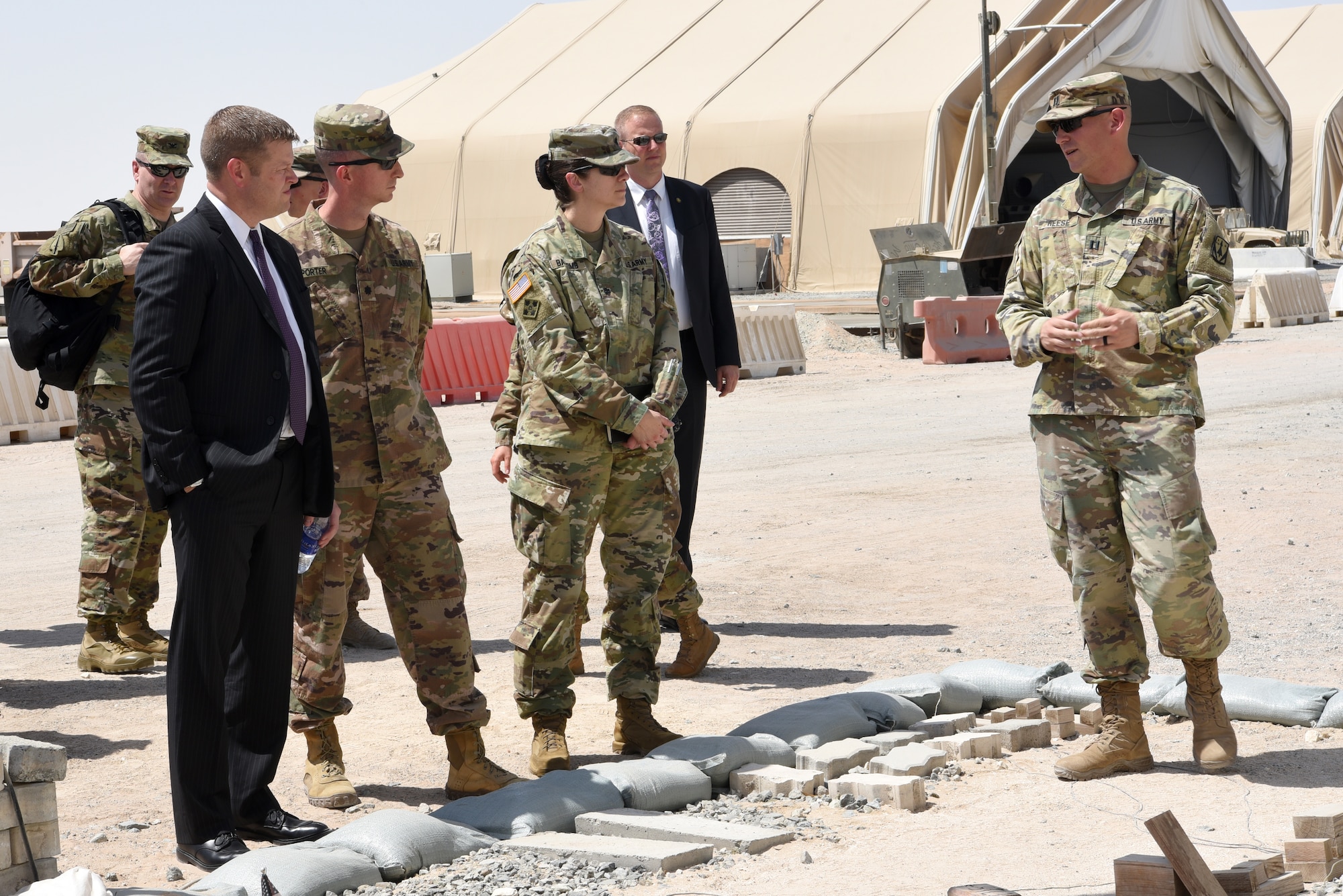 Capt. Denver Reese, 4th Battalion, 3rd Air Defense Artillery Regiment battery commander, briefs Ryan D. McCarthy, acting Secretary of the Army, during a sand table capabilities overview Sept. 20, 2019, at the Patriot site on Al Dhafra Air Base, United Arab Emirates.