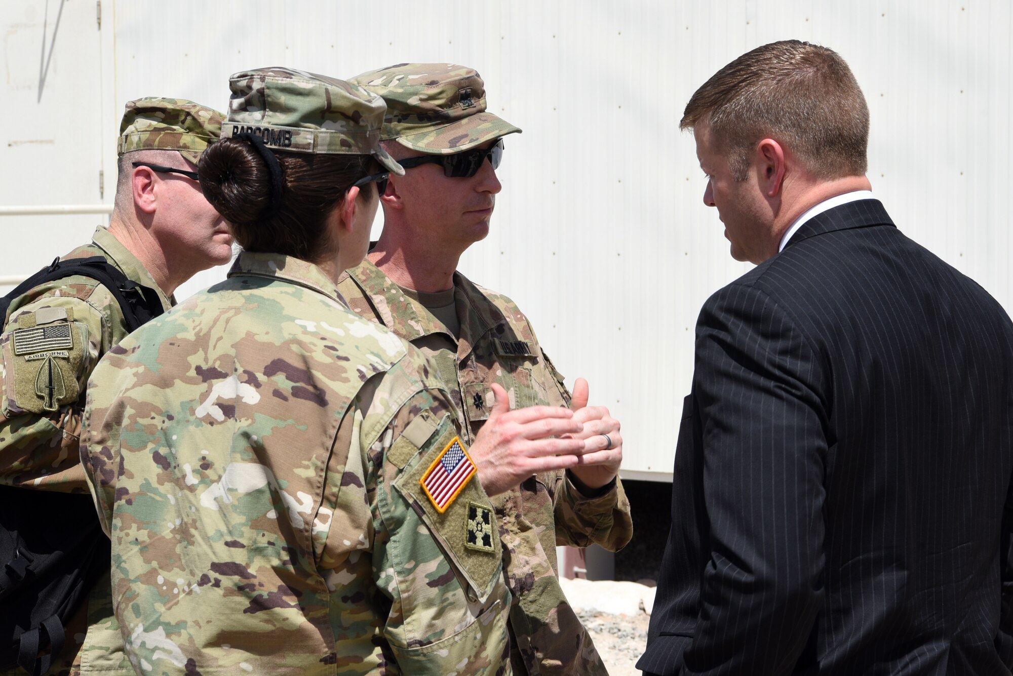 Ryan D. McCarthy, acting Secretary of the Army, speaks with Lt. Col. Jeffrey Porter, 4th Battalion, 3rd Air Defense Artillery Regiment battalion commander, during a sand table capabilities overview Sept. 20, 2019, at the Patriot site on Al Dhafra Air Base, United Arab Emirates.