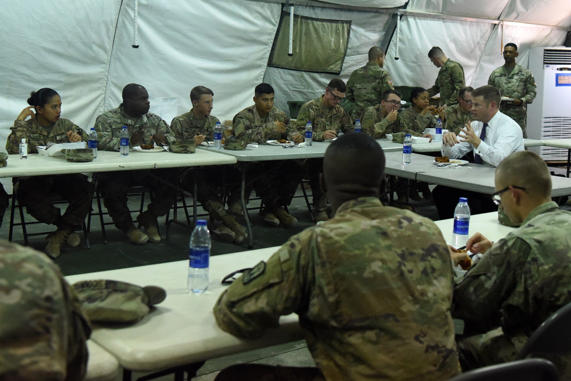 Ryan D. McCarthy, acting Secretary of the Army, has lunch with 4th Battalion, 3rd Air Defense Artillery Regiment soldiers, Sept. 20, 2019, at the Patriot site on Al Dhafra Air Base, United Arab Emirates.