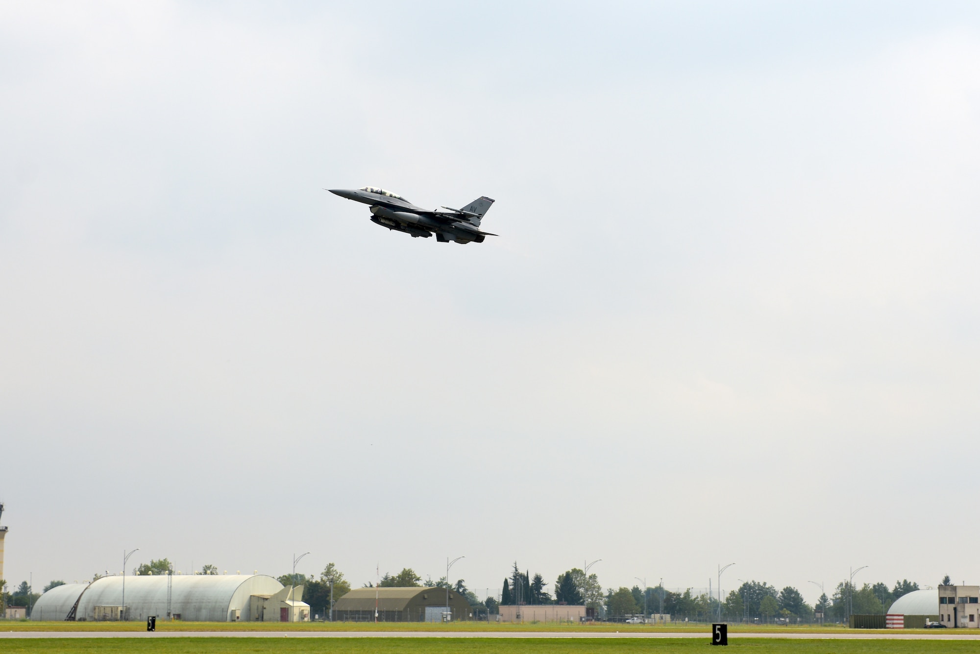 Italian air force Col. Vincenzo Tozzi, Aviano base commander, and U.S. Air Force Lt. Col. Daniel Lindsey, commander of the 510th Fighter Squadron, take off in an F-16 Fighting Falcon at Aviano Air Base, Italy, Sept. 17, 2019. Col. Tozzi was given a flight in an F-16 as a show of gratitude from the 31st Fighter Wing for his time as base commander. (U.S. Air Force photo by Staff Sgt. Kelsey Tucker)