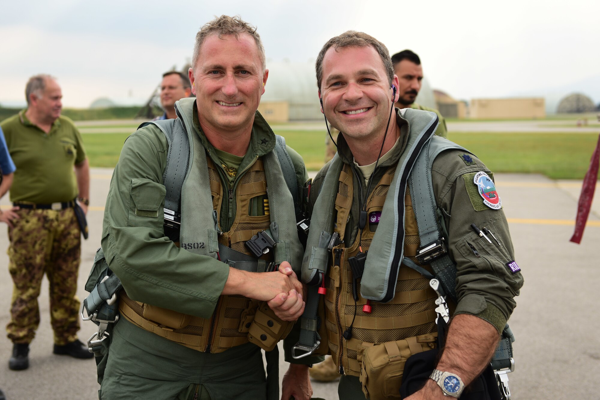 Italian air force Col. Vincenzo Tozzi, Aviano base commander, left, and U.S. Air Force Lt. Col. Daniel Lindsey, commander of the 510th Fighter Squadron, pose for a photo at Aviano Air Base, Italy, Sept. 17, 2019. Col. Tozzi was Lt. Col. Lindsey’s instructor pilot while they were at Sheppard Air Force Base, Texas, 16 years ago. (U.S. Air Force photo by Staff Sgt. Kelsey Tucker)