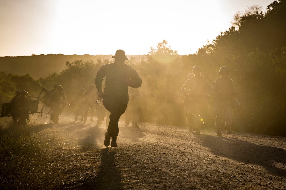 Sailors perform their final exercise in the Field Medical Service Technician Course at FMTB training site on Camp Pendleton, California, Sept. 18.