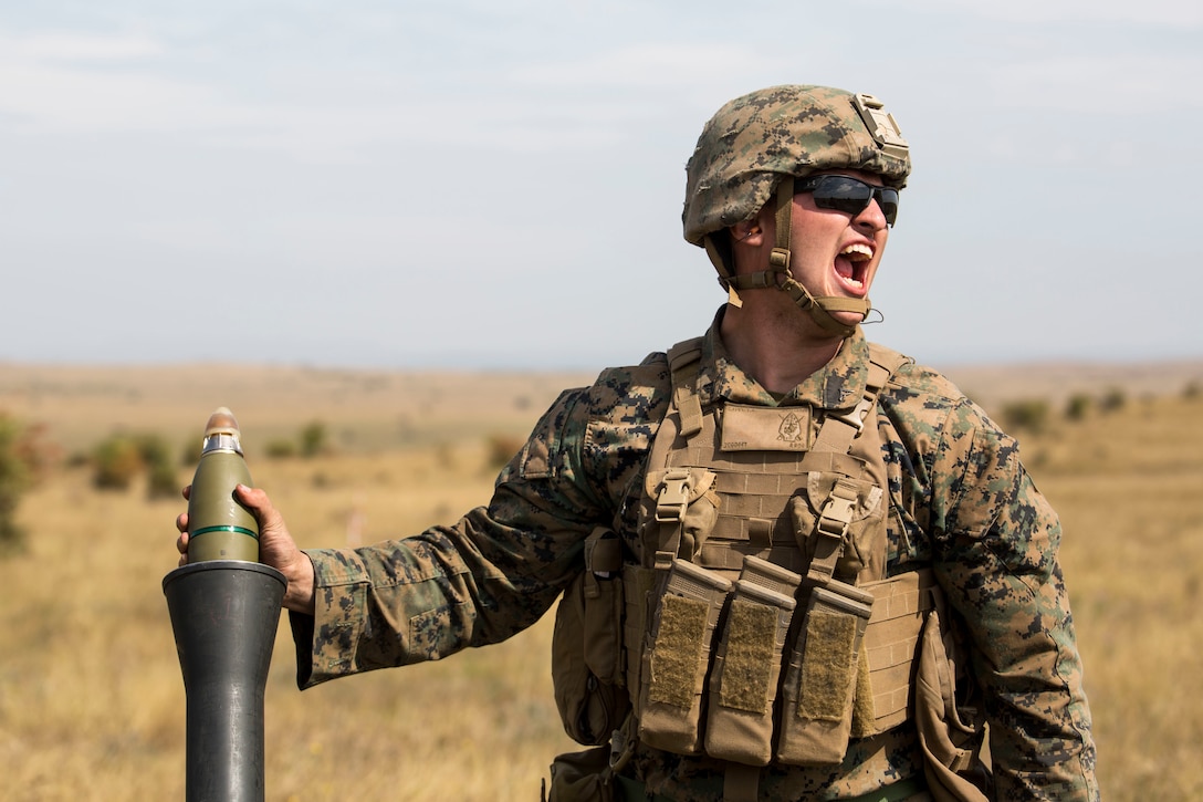 A U.S. Marine with Marine Rotational Force-Europe 19.2, Marine Forces Europe and Africa, prepares to fire an M252 81mm mortar system during exercise Platinum Eagle in Babadag Training Area, Romania, Sept. 17.