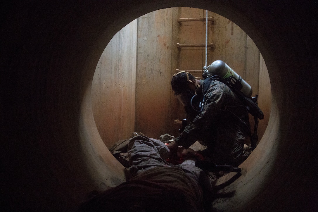 A U.S. Marine participates during the Explosive Ordinance Disposal Exercise 19 on Camp Hansen, Okinawa, Japan, Sept. 18.