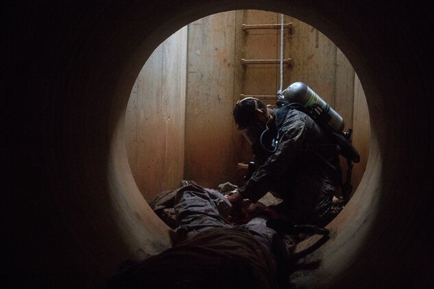 A U.S. Marine participates during the Explosive Ordinance Disposal Exercise 19 on Camp Hansen, Okinawa, Japan, Sept. 18.