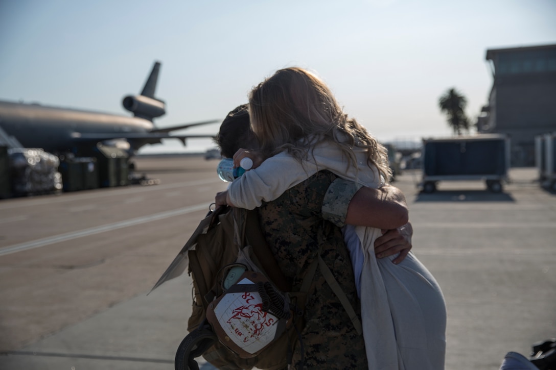 U.S. Marine Corps Capt. Robin Leilimarrazzo reunites with his wife during a homecoming ceremony at Marine Corps Air Station Miramar, Calif., September 15, 2019.