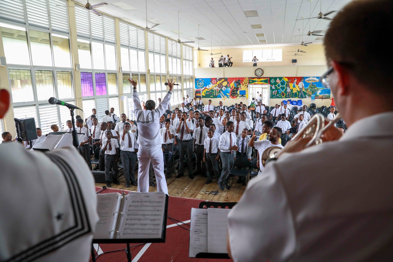 The U.S. Navy 4th fleet band delivers a performance to a Grenadian boys high school.