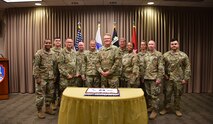 Chief Warrant Officer 5 Wesley Klees, center, command chief warrant officer, U.S. Army Space and Missile Defense Command, stands with SMDC warrant officers during his investiture ceremony Sept. 12 at the Peterson Air Force Base, Colorado, headquarters. (U.S. Army photo by Dottie White)