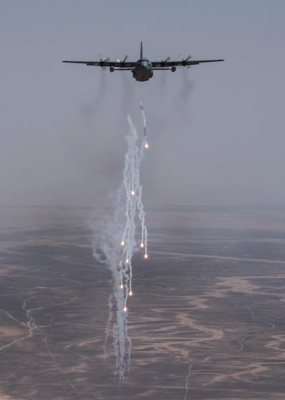 A C-130H3 from Dobbins Air Reserve Base, Georgia, punches out flares as part of an evasive maneuvers exercise over Jordan during Exercise Eager Lion on Sept. 1, 2019.