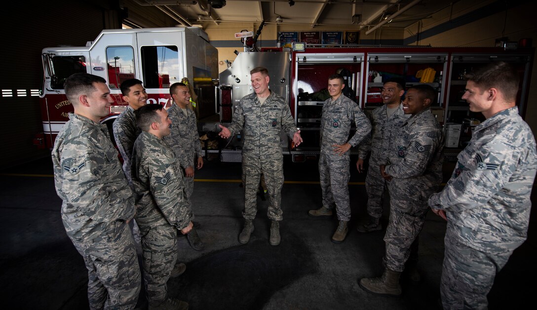 Senior Master Sgt. Andrew Kehl, 99th Civil Engineer Squadron Fire Department deputy fire chief, speaks with his Airmen at Nellis Air Force Base, Nevada, July 11, 2019. Since arriving at Nellis in March 2018, Kehl has focused on improving and empowering himself through reading, prioritizing and effectively leading his Airmen. (U.S. Air Force photo by Airman 1st Class Bailee A. Darbasie)