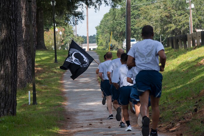 Airmen from the 628th Logistics Readiness Squadron run during a POW/MIA memorial run Sep. 20, 2019, at Joint Base Charleston, S.C.