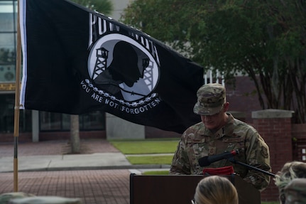 Chief Master Sgt. Ronnie Phillips, 437th Airlift Wing command chief, gives a speech prior to a retreat ceremony about a family relative who was a prisoner of war Sep. 20, 2019, at Joint Base Charleston, S.C.