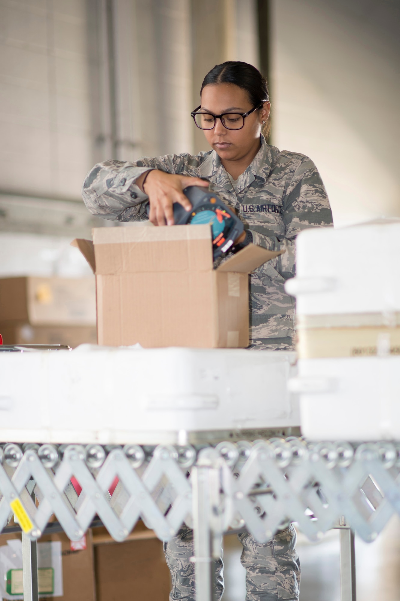 U.S. Air Force Airman Jennifer Lopez-Falcon, a material management specialist with the 116th Logistics Readiness Squadron, Georgia Air National Guard, checks parts that were turned in to be restocked or repaired at Robins Air Force Base, Ga, Sept. 20, 2019.