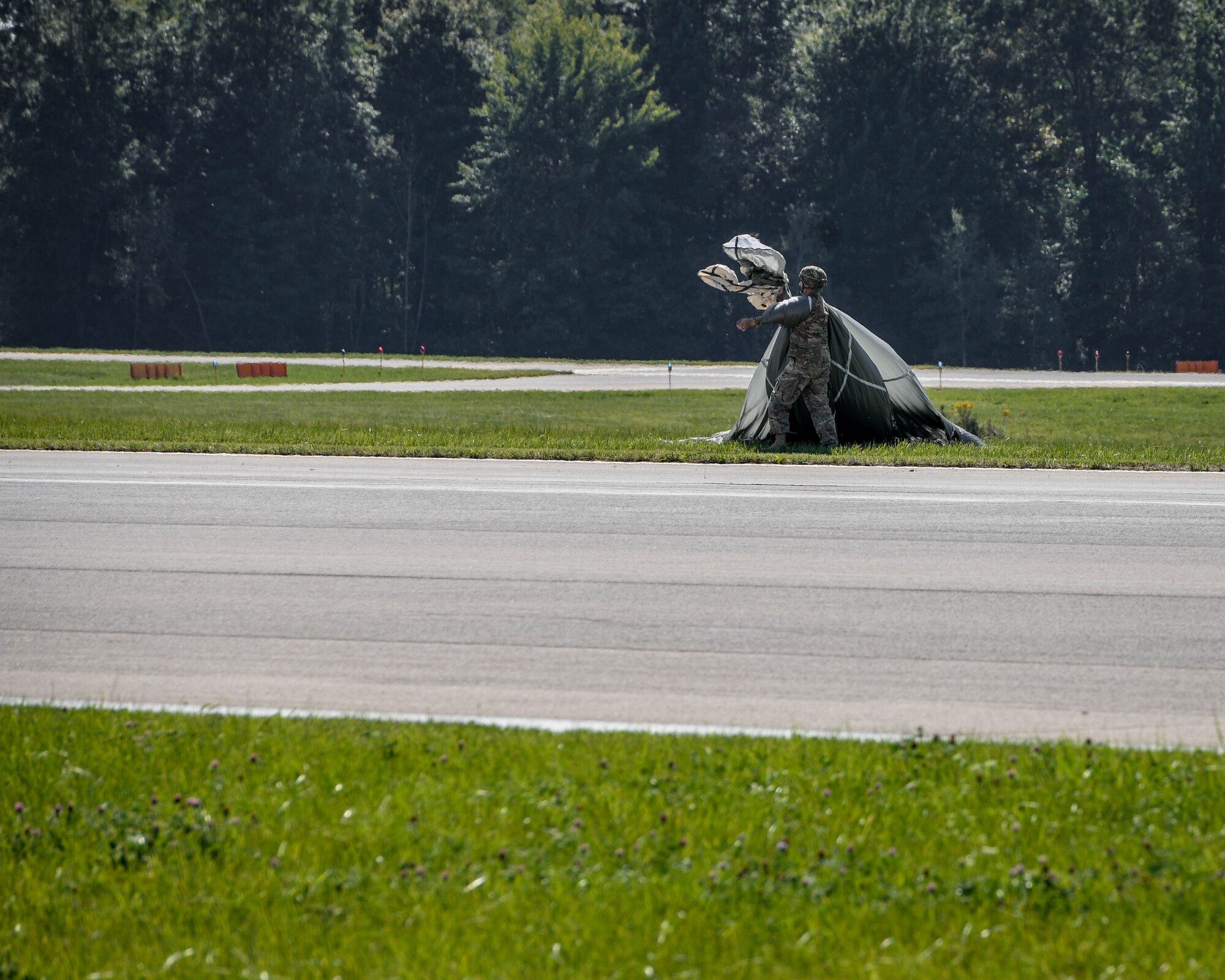 Soldiers from several Army Reserve battalions performed paratrooper jumps from a 910th Airlift Wing C-130 aircraft onto the Youngstown Air Reserve Station drop zone here, Sept. 20, 2019.