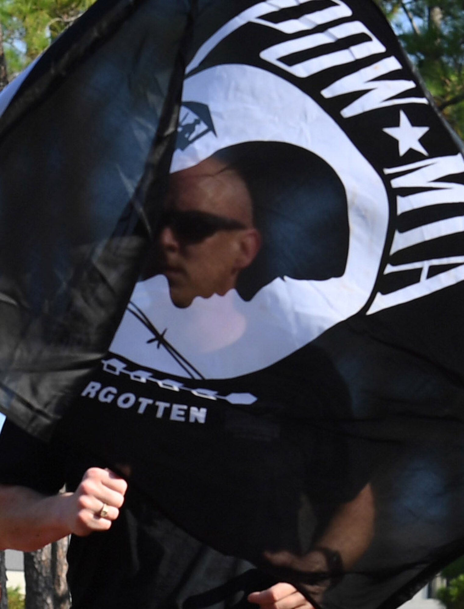 U.S. Air Force Chief Master Sgt. Timothy Gibson, 602nd Training Group (Provisional) superintendent, participates in Keesler’s POW/MIA 24-hour memorial run and vigil at the Crotwell Track on Keesler Air Force Base, Mississippi, Sept. 18, 2019. This event is held annually to raise awareness and pay tribute to all prisoners of war and the military members still missing in action. (U.S. Air Force photo by Kemberly Groue)