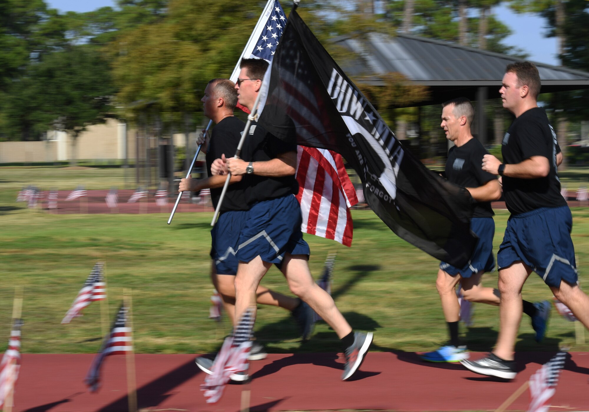 Members of Second Air Force participate in Keesler’s POW/MIA 24-hour memorial run and vigil at the Crotwell Track on Keesler Air Force Base, Mississippi, Sept. 18, 2019. This event is held annually to raise awareness and pay tribute to all prisoners of war and the military members still missing in action. (U.S. Air Force photo by Kemberly Groue)