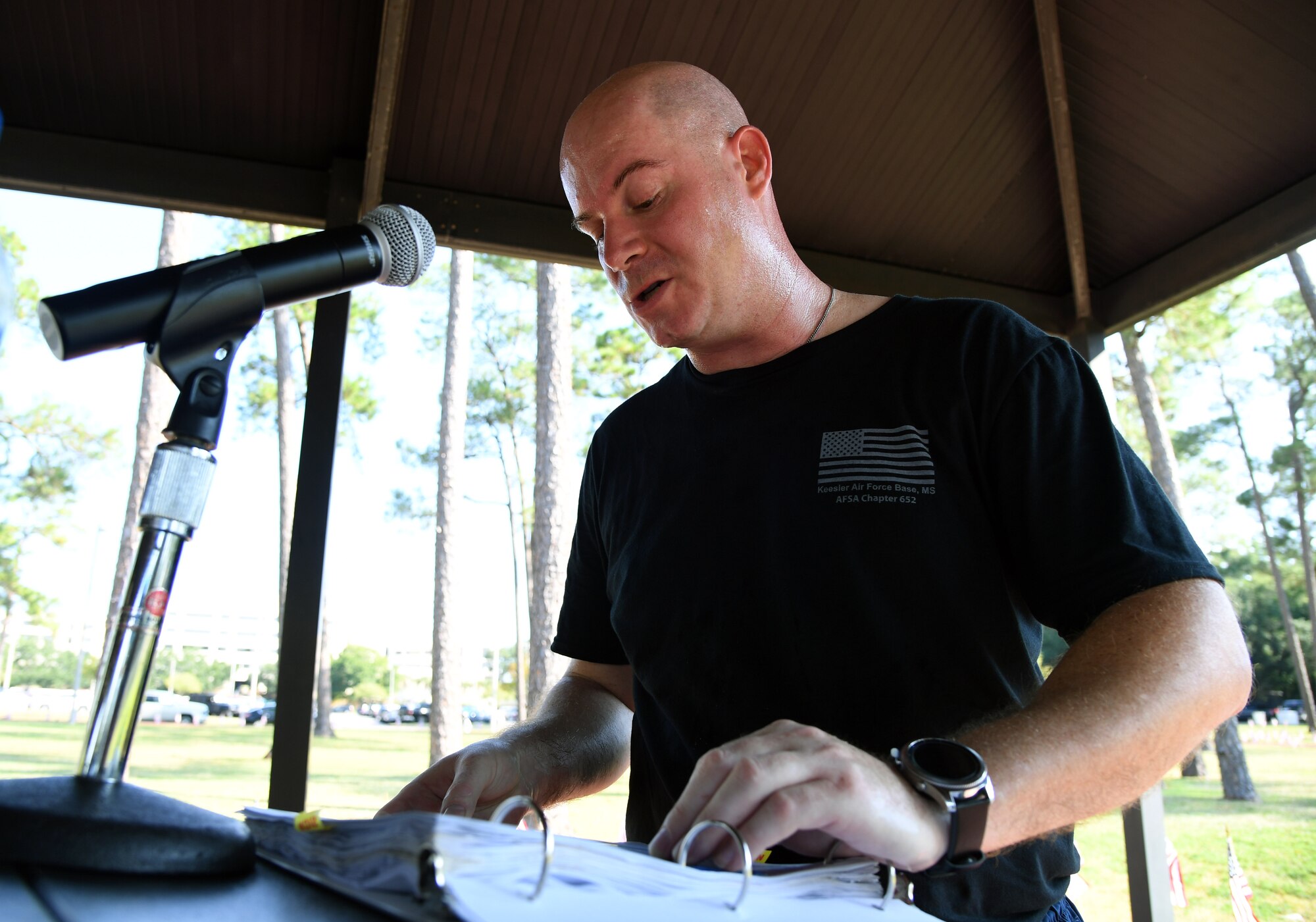 U.S. Air Force Senior Master Sgt. Sean Brasier, Second Air Force command military training leader, reads the names of those who were prisoners of war or are missing in action during Keesler’s POW/MIA 24-hour memorial run and vigil at the Crotwell Track on Keesler Air Force Base, Mississippi, Sept. 18, 2019. This event is held annually to raise awareness and pay tribute to all prisoners of war and the military members still missing in action.  (U.S. Air Force photo by Kemberly Groue)