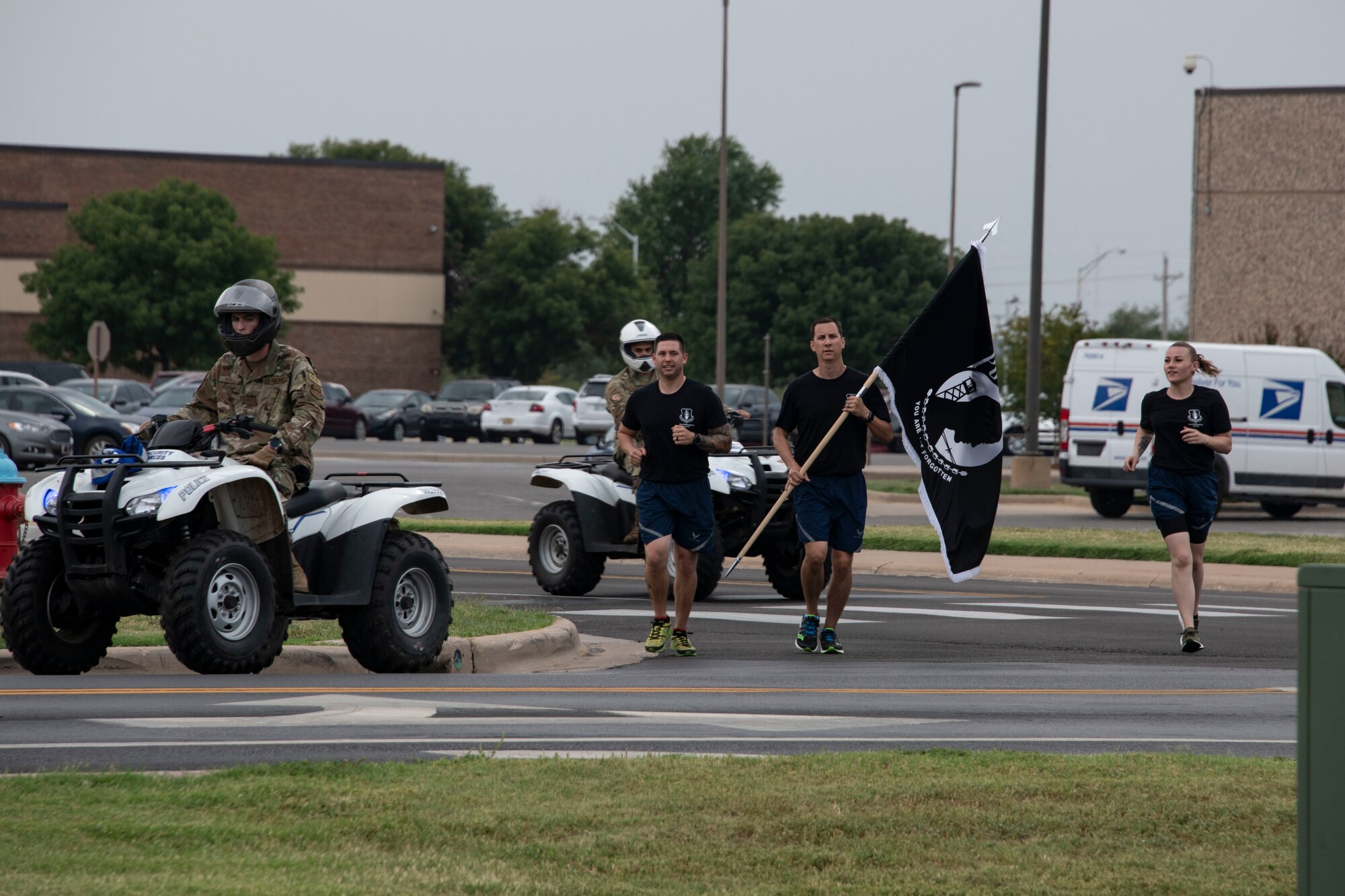 Members of Altus Warrior 5/6 council bring the POW/MIA flag to Wings of Freedom Park to officially end the 24-hour POW/MIA remembrance run