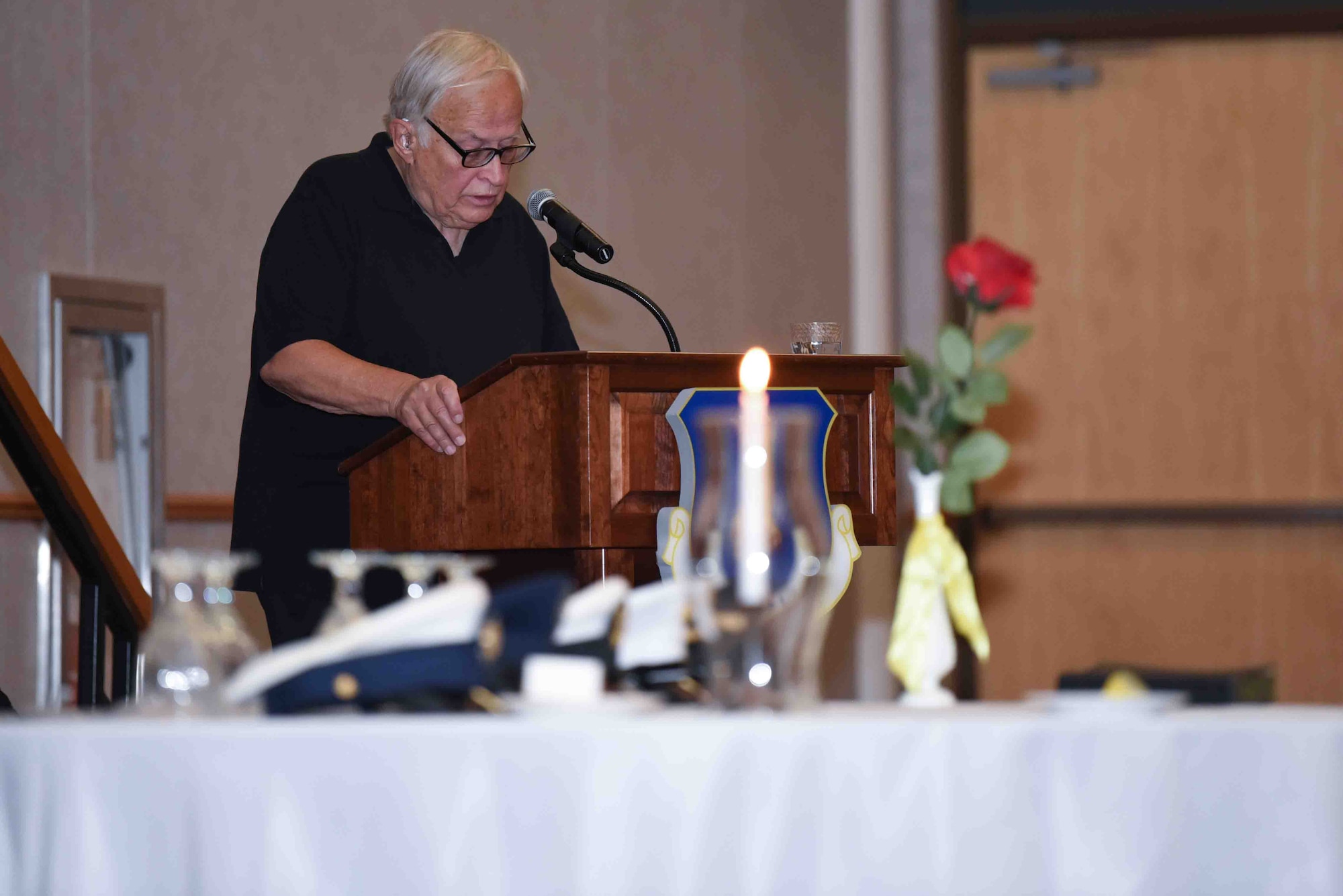 Retired U.S. Army Maj. Ted Gostas, prisoner of war guest speaker, shares his story with Airmen Sept. 19, 2019, at McConnell Air Force Base, Kan. Gostas was captured in 1968 by Vietnamese soldiers and held captive for five years, one month and 15 days. He was finally released in March of 1973 and went on to become a renowned Vietnam Conflict POW painter. (U.S. Air Force photo by Airman 1st Class Alexi Bosarge)