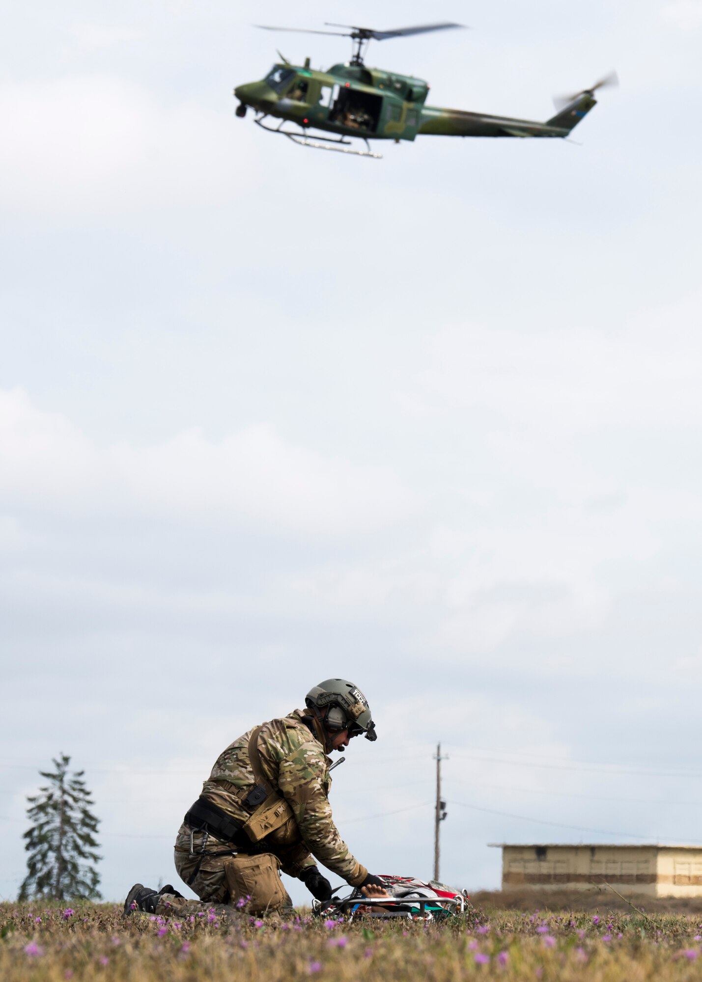 U.S. Air Force Tech. Sgt. James Pennington, 336th Training Group independent medical technician, performs a rescue demonstration prior to the commemoration ceremony of the 36th Rescue Squadron reaching 700 saves at Fairchild Air Force Base, Washington, Sept. 20, 2019. The 36th RQS began its rescue operations in 1971, providing support to Survival, Evasion, Resistance and Escape specialists, as well as civilian emergency search and rescue coverage of the Inland Northwest. (U.S. Air Force photo by Airman 1st Class Lawrence Sena)