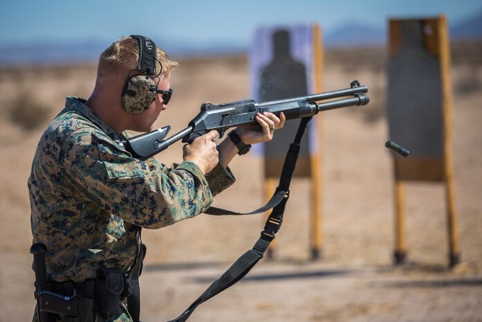 U.S. Marines with the Provost Marshals Office (PMO), Headquarters and Headquarters Squadron, Marine Corps Air Station (MCAS) Yuma, engage targets during a law enforcement (LE) range qualification on MCAS Yuma, Sep. 18th 2019. The LE qualification is specific to military police personnel, including several different shooting methods with both the Beretta M9 and Benelli 12 gauge shotgun. (U.S. Marine Corps photo by Lance Cpl John Hall)