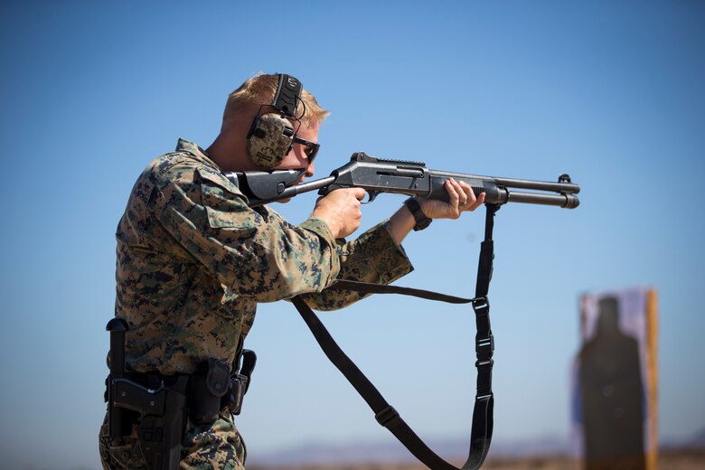 U.S. Marines with the Provost Marshals Office (PMO), Headquarters and Headquarters Squadron, Marine Corps Air Station (MCAS) Yuma, engage targets during a law enforcement (LE) range qualification on MCAS Yuma, Sep. 18th 2019. The LE qualification is specific to military police personnel, including several different shooting methods with both the Beretta M9 and Benelli 12 gauge shotgun. (U.S. Marine Corps photo by Lance Cpl John Hall)