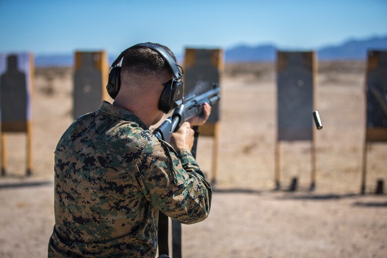 U.S. Marines with the Provost Marshals Office (PMO), Headquarters and Headquarters Squadron, Marine Corps Air Station (MCAS) Yuma, engage targets during a law enforcement (LE) range qualification on MCAS Yuma, Sep. 18th 2019. The LE qualification is specific to military police personnel, including several different shooting methods with both the Beretta M9 and Benelli 12 gauge shotgun. (U.S. Marine Corps photo by Lance Cpl John Hall)