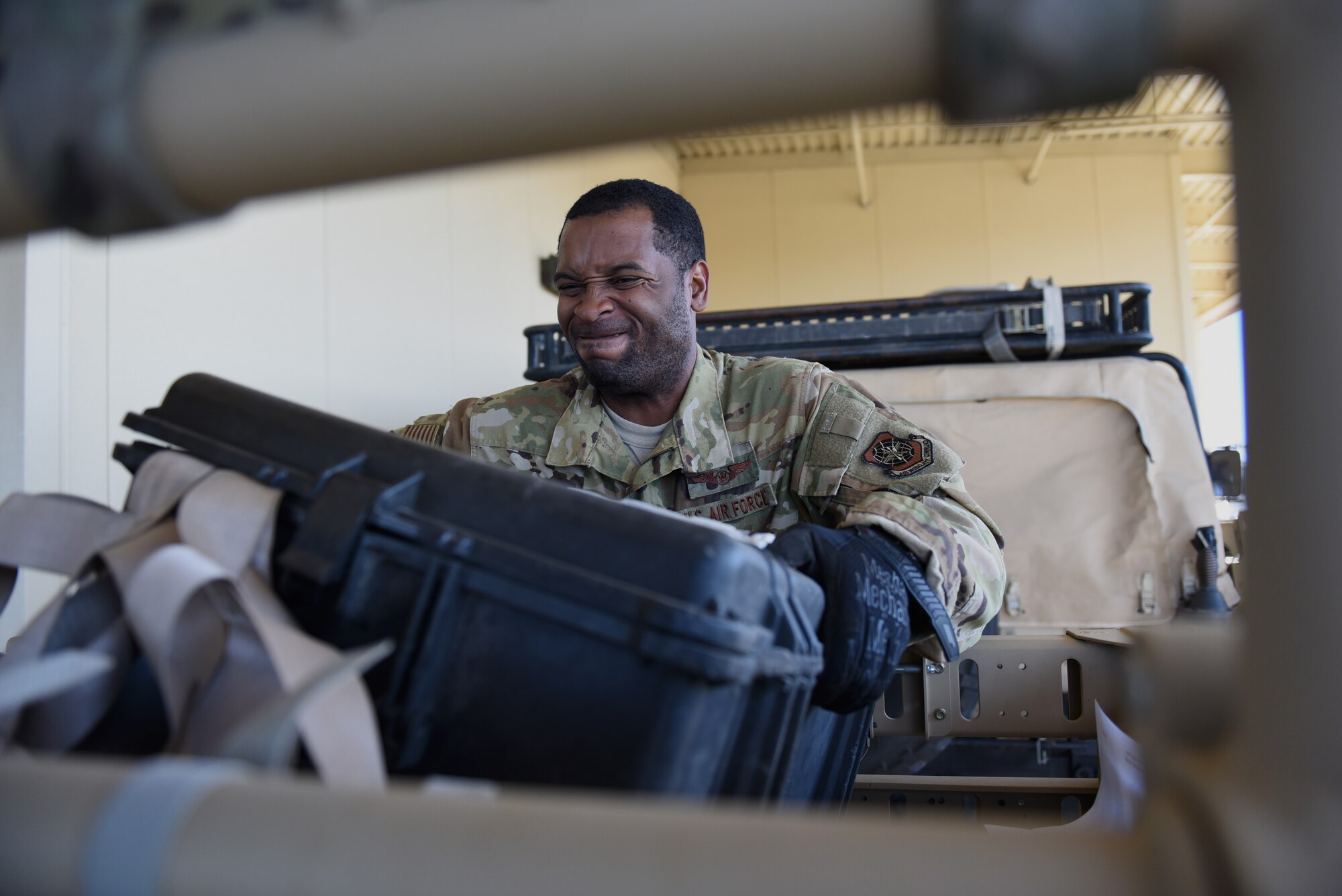 U.S. Air Force Staff Sgt. Brandon Mckoy, 821st Contingency Response Support Squadron airfield assessment team member, loads equipment into truck in support of Mobility Guardian 2019 Sept. 12, 2019, at Travis Air Force Base, California. MG19 is Air Mobility Command’s flagship exercise for large-scale rapid global mobility operations. Travis AFB is serving as a staging base for the exercise, which is taking place at Fairchild AFB, Washington. (U.S. Air Force photo by Airman First Class Cameron Otte)