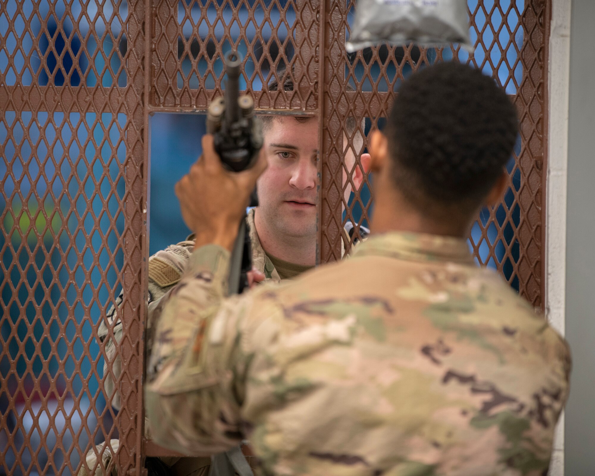 U.S. Air Force Capt. Chance Aycock, 321st Contingency Response Squadron flight commander, receives his weapon during deployment processing Sept. 14, 2019, at Travis Air Force Base, California. Contingency response forces from the U.S. and Royal Australian Air Forces staged at Travis AFB before deploying in support of exercise Mobility Guardian 2019. MG19 is Air Mobility Command’s flagship exercise for large-scale rapid global mobility operations. Forty-six U.S. aircraft will join aircraft from 29 international partners, along with more than 4,000 U.S. and international Air Force, Army, Navy and Marine Corps aviators. (U.S. Air Force photo by Louis Briscese)
