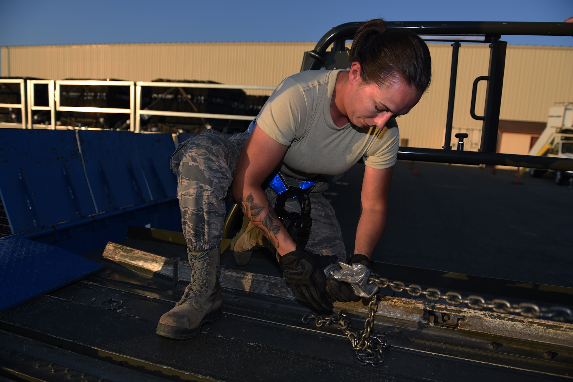U.S. Air Force Airman Naomi Hill, 60th Aerial Port Squadron ramp operations journeyman, fastens cargo for transport on a C-5M Super Galaxy Sept. 13, 2019, at Travis Air Force Base, California. MG19 is Air Mobility Command’s largest enterprise-wide training event with more than 4,000 joint and international personnel integrated to hone teamwork and improve longstanding partnerships. MG19 also validates the Air Force’s readiness to conduct mobility operations in contested, degraded and operationally-limited environments. (U.S. Air Force photo by Airman 1st Class Cameron Otte)