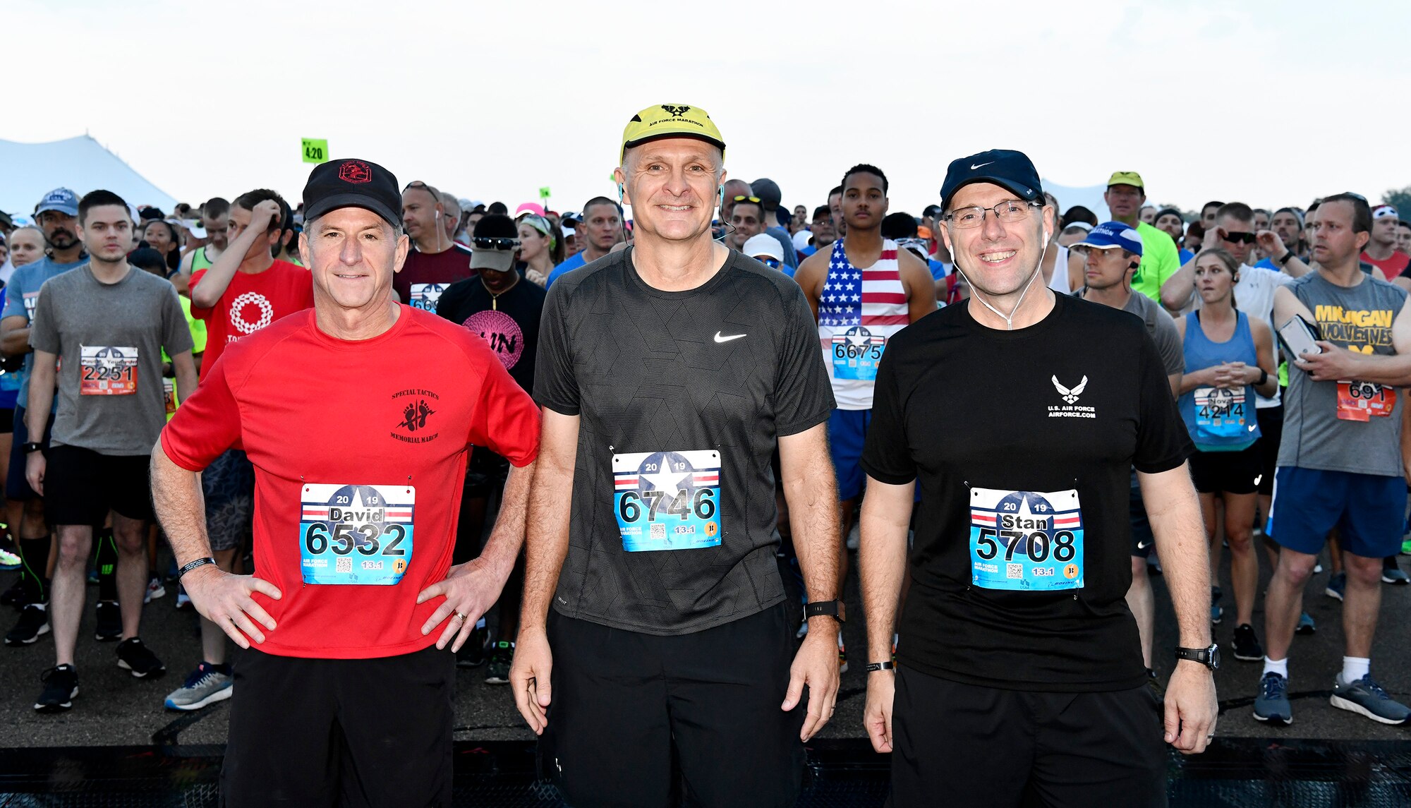 Air Force Chief of Staff Gen. David L. Goldfein, Air Force Materiel Command’s commander, Gen. Arnold W. Bunch Jr., and Chief Master Sgt. Stanley Cadell, AFMC Command Chief, prepare to run the half-marathon in the 23rd Air Force Marathon, hosted by Wright-Patterson Air Force Base, Ohio, Sept. 21, 2019. The marathon attracts more than 13,500 runners yearly, and the course spans through the adjacent towns, celebrating the birthday and the history of the U.S. Air Force. (U.S. Air Force photo by Scott M. Ash)