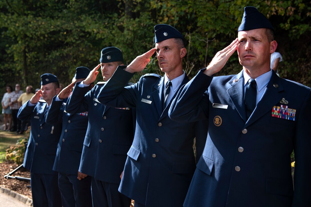U.S. Air Force Airmen from Spangdahlem Air Base, Germany, render a salute during a ceremony in celebration of the 75th anniversary of the liberation of Ettelbruck, Luxembourg, at the Lt. Gen. Patton Monument in Ettelbruck, Sept. 22, 2019. Operations such as the liberation of Ettelbruck in 1944 helped forge the partnership that America has with Allied nations today. (U.S. Air Force photo by Airman 1st Class Valerie Seelye)