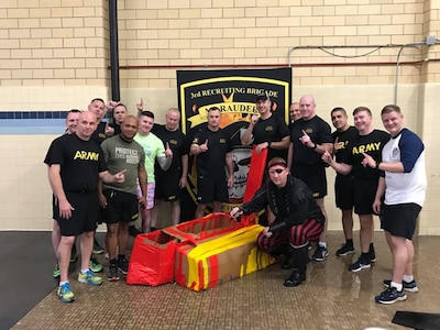 The command teams of the Chicago Recruiting Battalion pose for a photo following the "Boat Wars" competition at Gammon Physical Fitness Center, Fort Knox, Kentucky, Sept. 22. Chicago Recruiting Battalion won first place. The competition was part of a three-day training forum hosted by 3rd Recruiting Brigade to prepare for successful support to the Army’s 2020 recruiting goal.