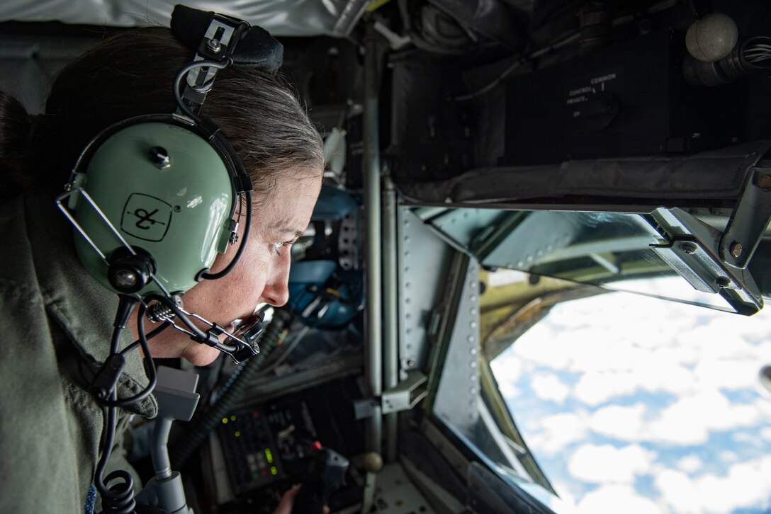 Women aviators pose for a photo.