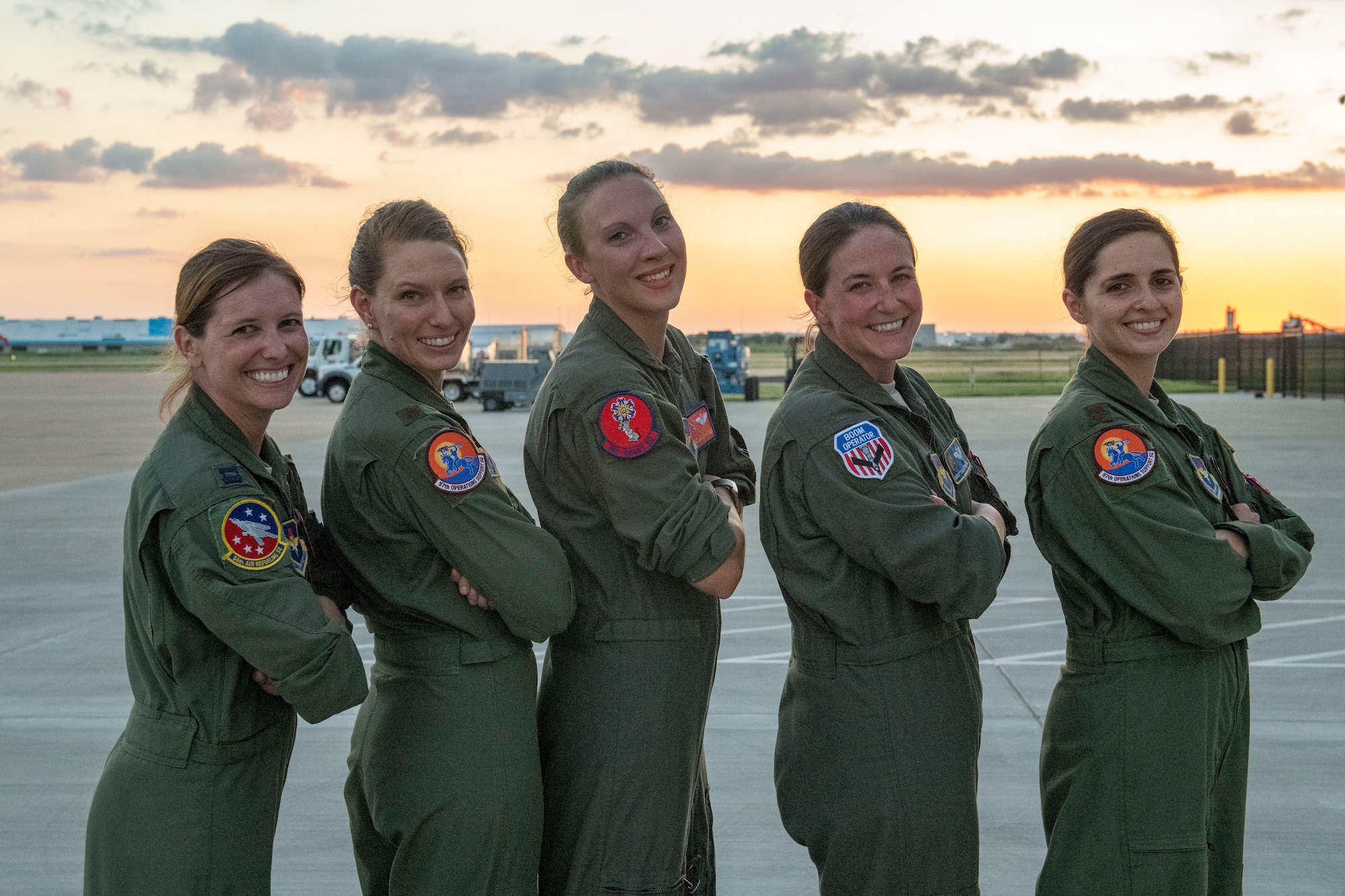 Women aviators pose for a photo.