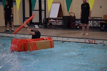 Lt. Col. Kevin Groppel, battalion commander, Chicago Recruiting Battalion, paddles his way to a win in the "Boat Wars" competition at Gammon Physical Fitness Center, Fort Knox, Kentucky, Sept. 22. The competition was part of a three-day training forum hosted by 3rd Recruiting Brigade to prepare for successful support to the Army’s 2020 recruiting goal.