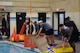 Battalion leadership teams prepare to put their boats in the pool for the "Boat Wars" competition at Gammon Physical Fitness Center here Sept. 22. The "Boat War" was a team building exercise that leadership teams participated in during the 3rd Recruiting Brigade's three-day training forum.