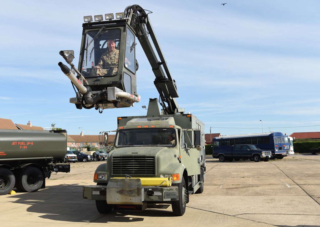Chief Master Sgt. Randy Kwiatkowski, Third Air Force command chief, demos a de-icing truck during a visit to RAF Mildenhall, England, Sept. 13, 2019. The newly-minted command chief met and spoke with Airmen about concepts related to mindfulness, time management, responsibilities to the mission and resiliency amongst other topics. (U.S. Air Force photo by Airman 1st Class Brandon Esau)