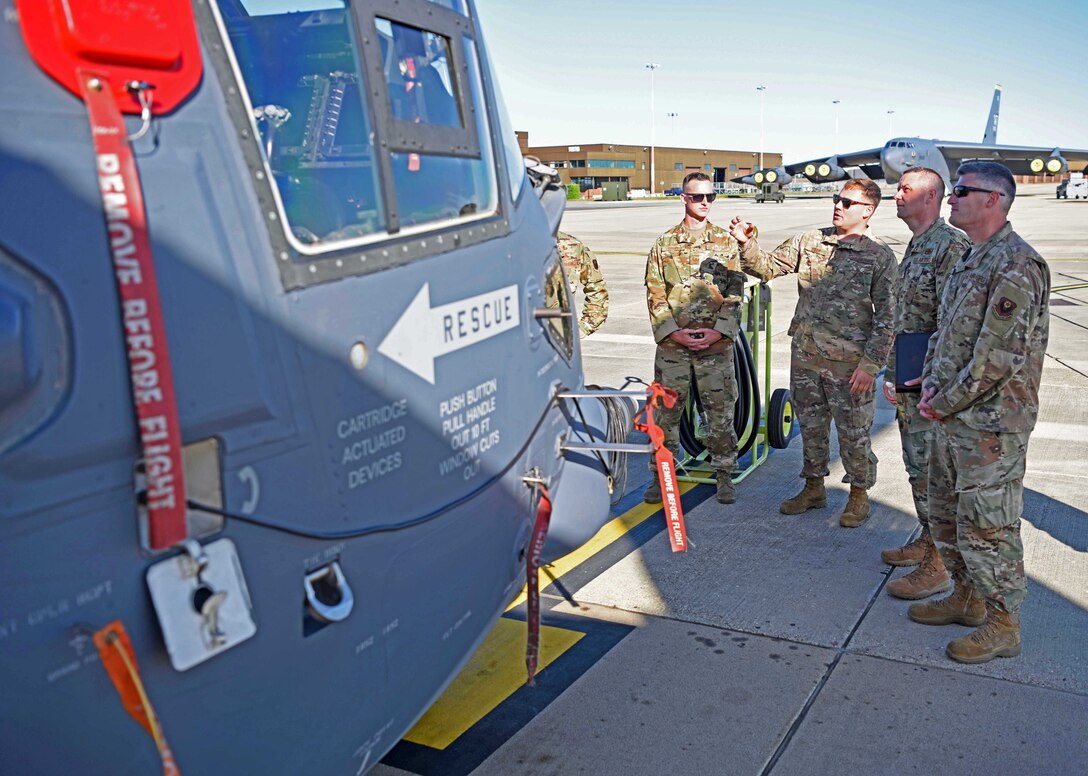 Chief Master Sgt. Randy Kwiatkowski, Third Air Force command chief, receives a briefing on the capabilities of the CV-22 Osprey from Airmen of the 352nd Special Operations Wing during a visit to RAF Mildenhall, England, Sept. 13, 2019. He also toured the 100th Maintenance Group mission ready AGE technician score concept, met with flight-line technicians and met with the 351st Air Refueling Squadron to learn about squadron capabilities. (U.S. Air Force photo by Airman 1st Class Brandon Esau)