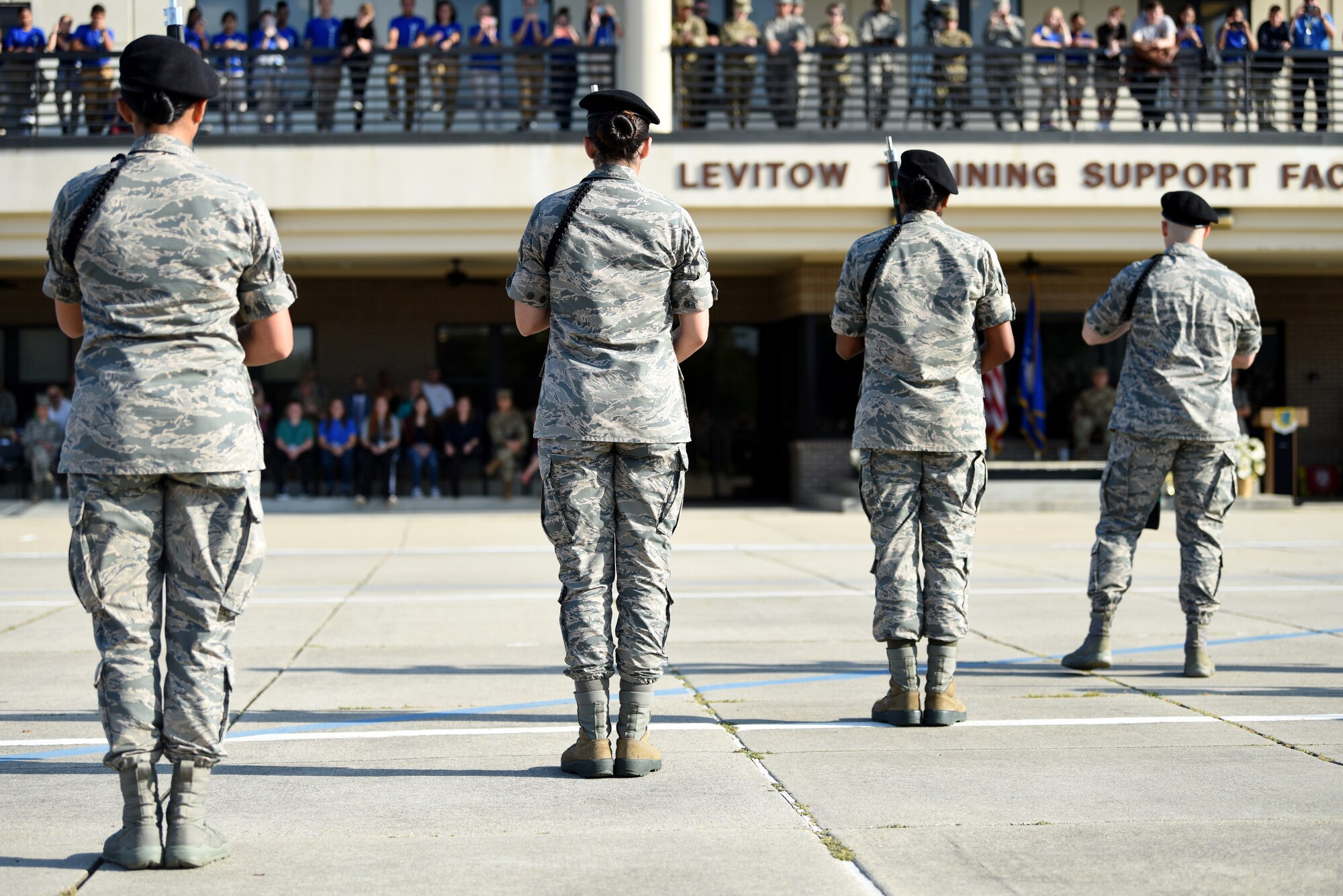 Members of the 334th Training Squadron freestyle drill team perform during the 81st Training Group drill down on the Levitow Training Support Facility drill pad at Keesler Air Force Base, Mississippi, Sept. 20, 2019. Airmen from the 81st TRG competed in a quarterly open ranks inspection, regulation drill routine and freestyle drill routine. While in training, Airmen are given the opportunity to volunteer to learn and execute drill down routines. (U.S. Air Force photo by Airman Seth Haddix)