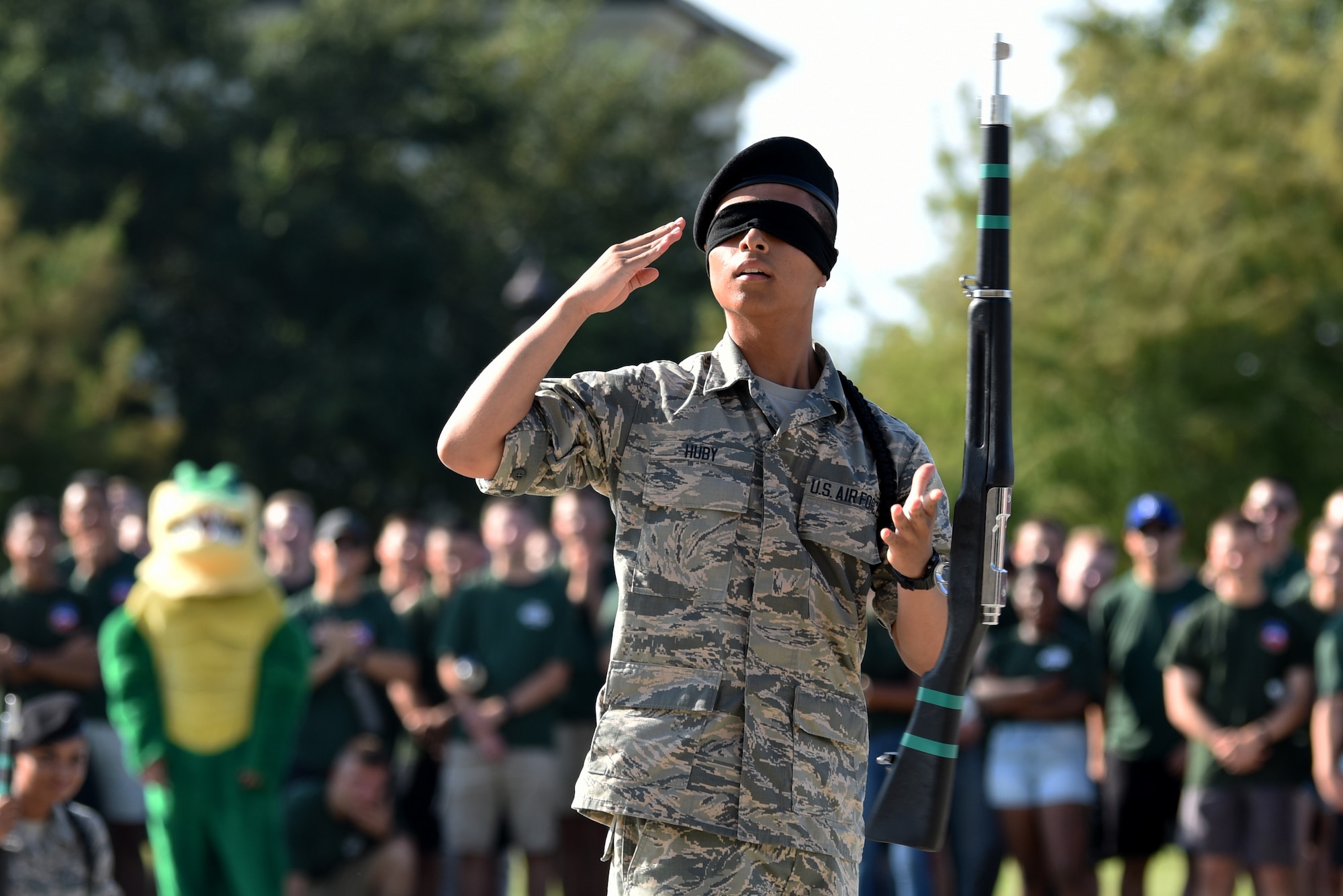 U.S. Air Force Airman 1st Class Jeanpierre Huby, 334th Training Squadron student, performs during the 81st Training Group drill down on the Levitow Training Support Facility drill pad at Keesler Air Force Base, Mississippi, Sept. 20, 2019. Airmen from the 81st TRG competed in a quarterly open ranks inspection, regulation drill routine and freestyle drill routine. While in training, Airmen are given the opportunity to volunteer to learn and execute drill down routines. (U.S. Air Force photo by Airman Seth Haddix)