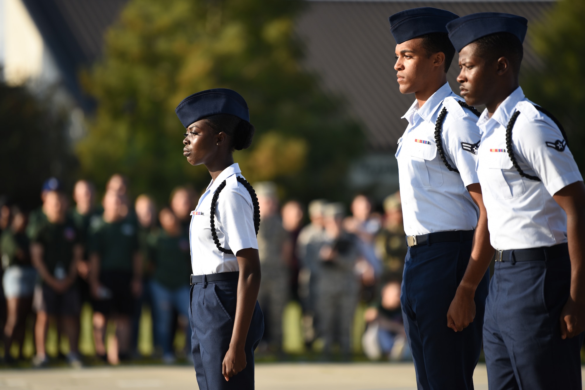 U.S. Air Force Airmen Precious Bissah, Wendell Watson III and Airman 1st Class Enrique Talley, 336th Training Squadron drill team members, perform during the 81st Training Group drill down on the Levitow Training Support Facility drill pad at Keesler Air Force Base, Mississippi, Sept. 20, 2019. Airmen from the 81st TRG competed in a quarterly open ranks inspection, regulation drill routine and freestyle drill routine. While in training, Airmen are given the opportunity to volunteer to learn and execute drill down routines. (U.S. Air Force photo by Airman Seth Haddix)